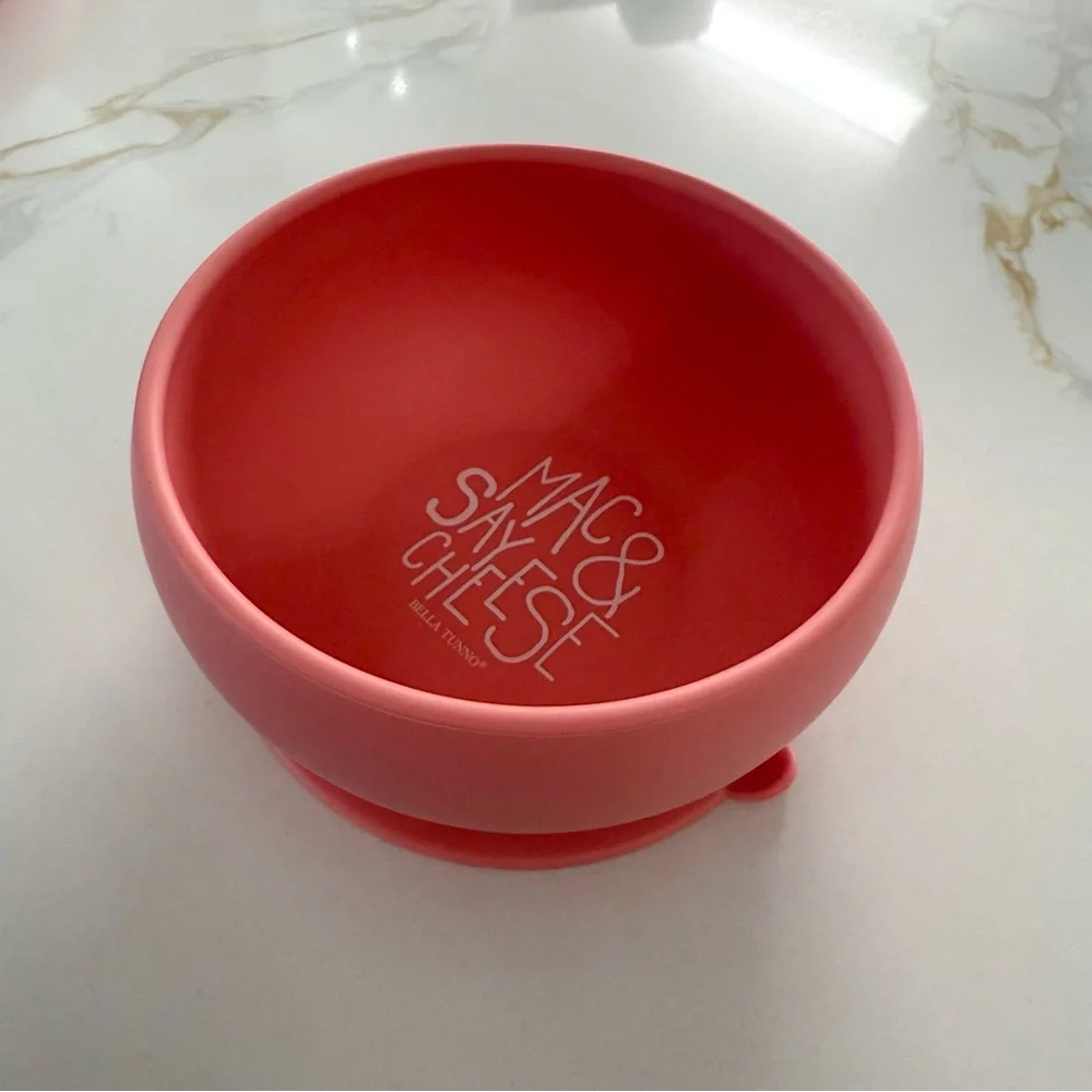 Three Silicone Baby Plates and one Pink Bib